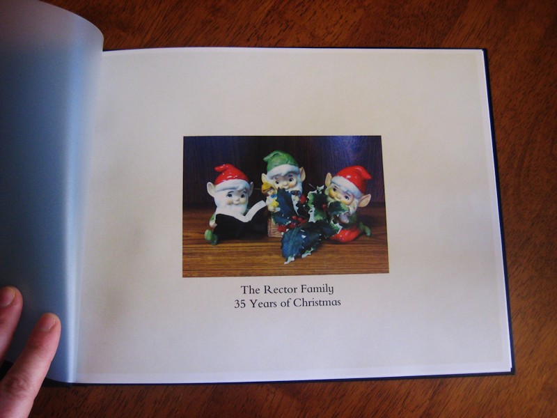 Inside front cover. This shows through on the front. My porcelain Christmas elves. 